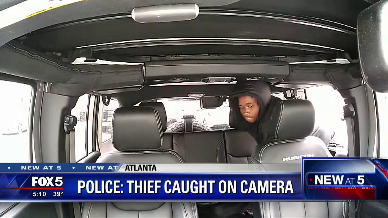 Police release clear video of thief breaking into car
