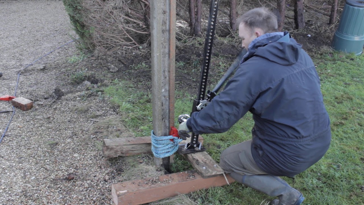 removing concrete fence post