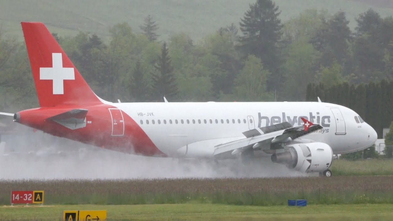 Helvetic Airways A319 Landing at Bern Airport - Reverse Thrust Spray and Water Cannon Salute
