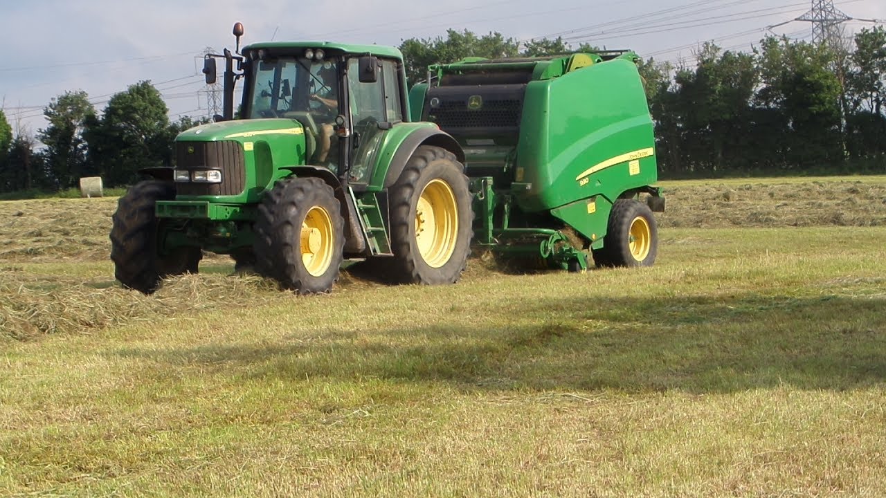 John Deere 6830 With 990 Round Baler.