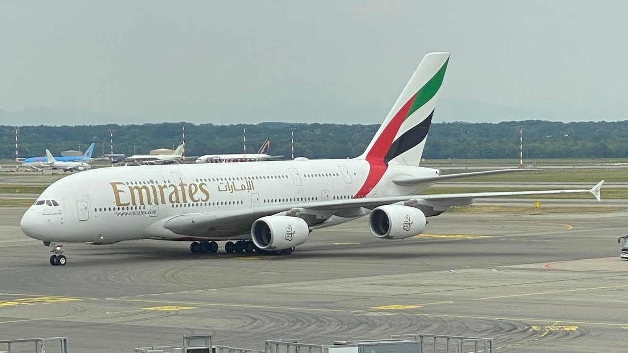 Taking off from Milan Airport MXP to DXB dubai with emirates Airbus A380-800. 