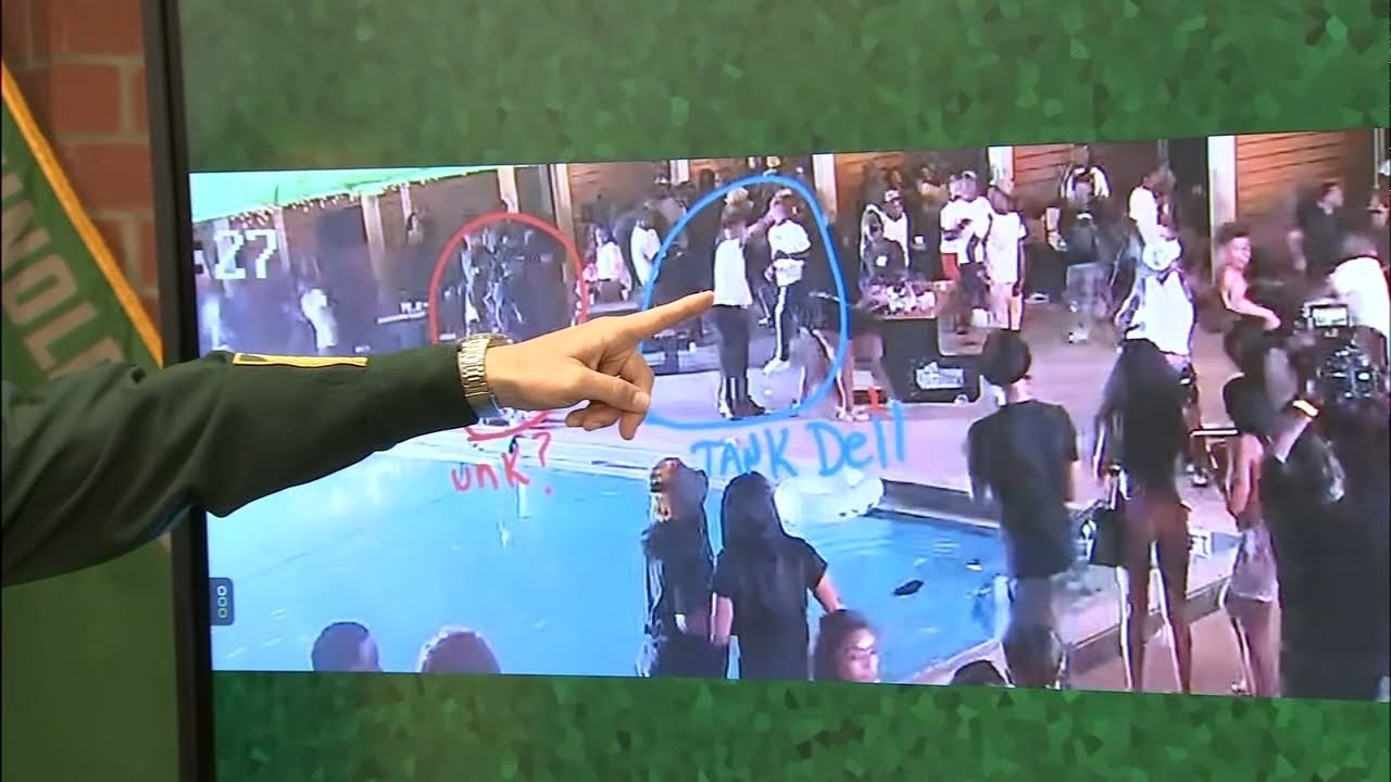 Tank Dell stood between gunmen when he was wounded, video shows