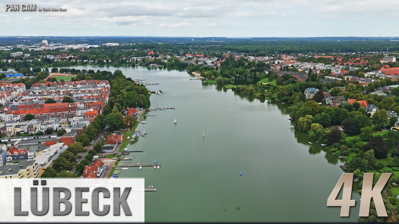 L&uuml;beck, Germany: St. J&uuml;rgen, Innenstadt, St. Gertrud - Wakenitz - Luftpanorama - 4K - 0452