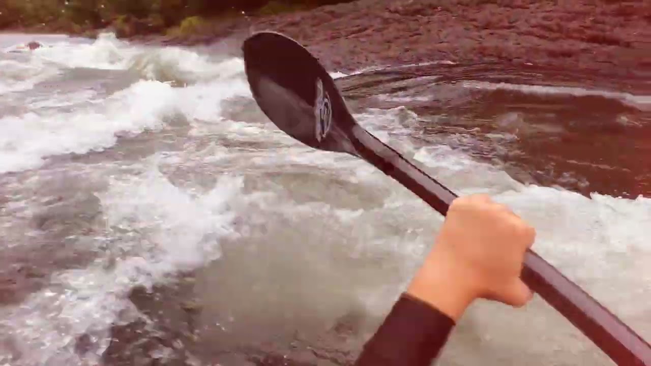9yr old Angus kayaking the Tully River, Queensland, Australia