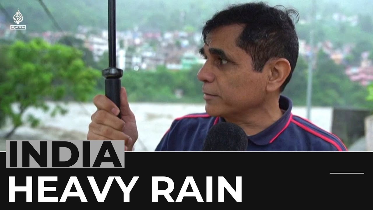India monsoon: Floods and landslides kill at least 12 people