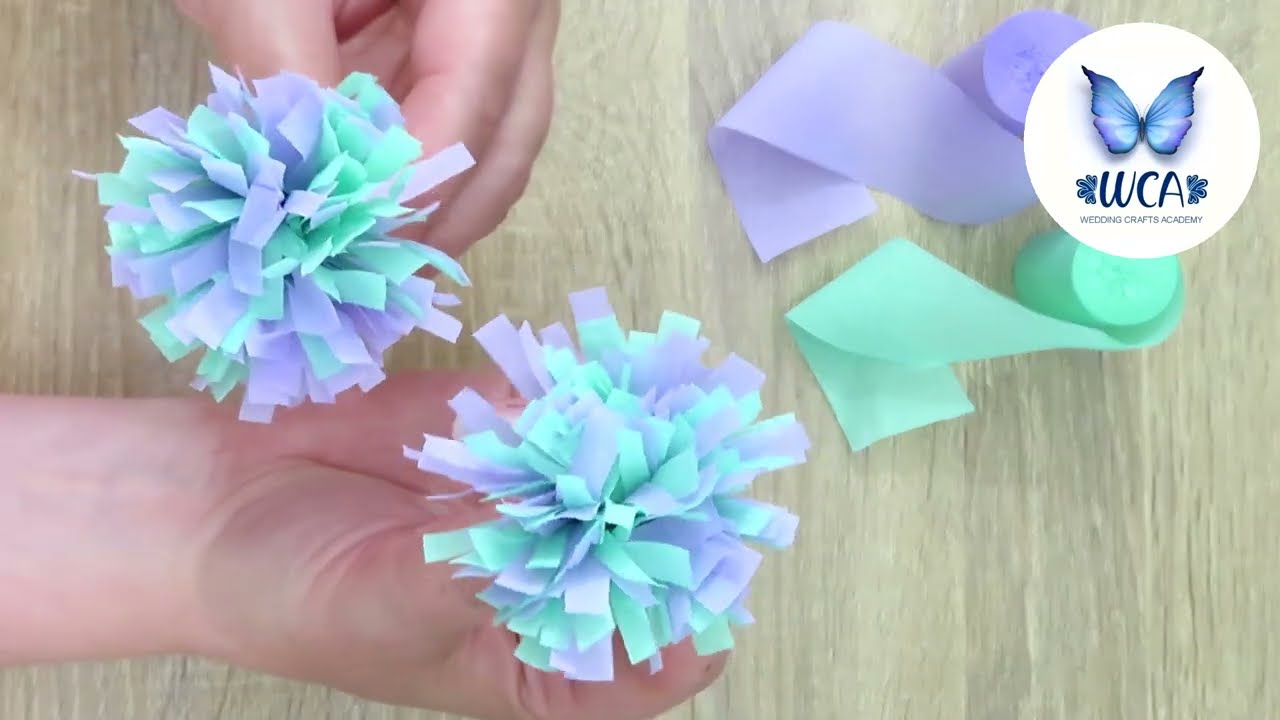 Make pretty pompom flowers out of crepe streamers
