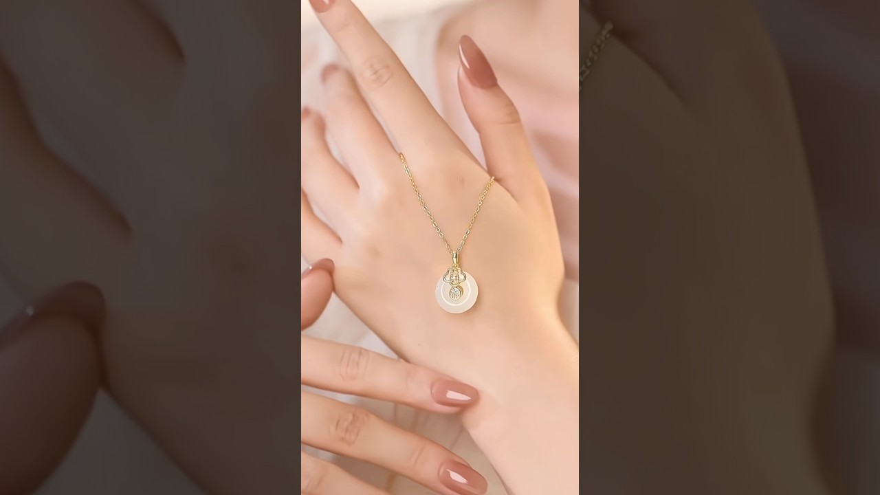 Hetian Jade Necklace: Smooth jade pendant with gold 'fu' detail.#love #jewelry #necklace #jade
