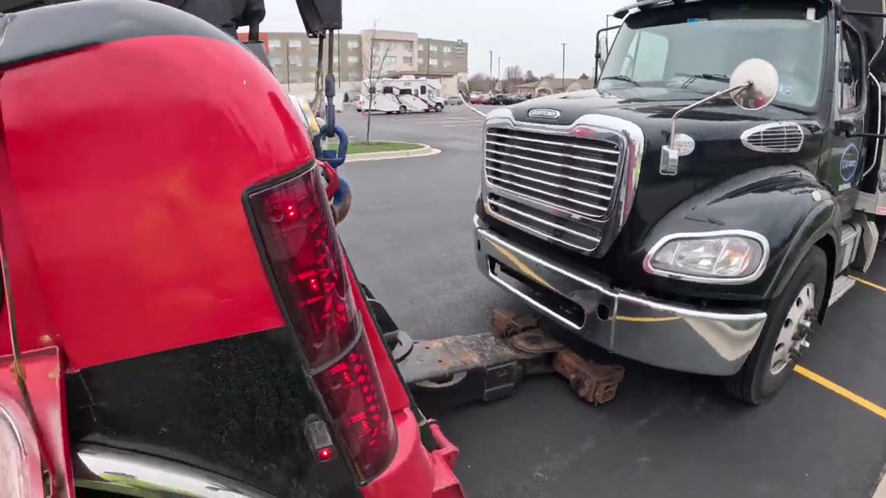 McKay’s wrecker service with a box truck tow