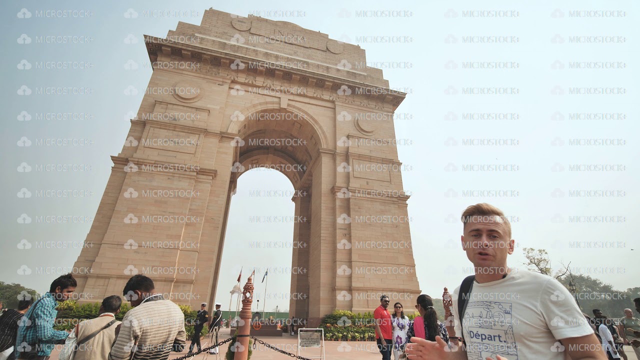 New Delhi, India - November 28, 2018: Russian guide talks about India Gate.