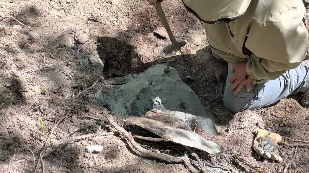 Splitting rocks with Feathers and wedge.