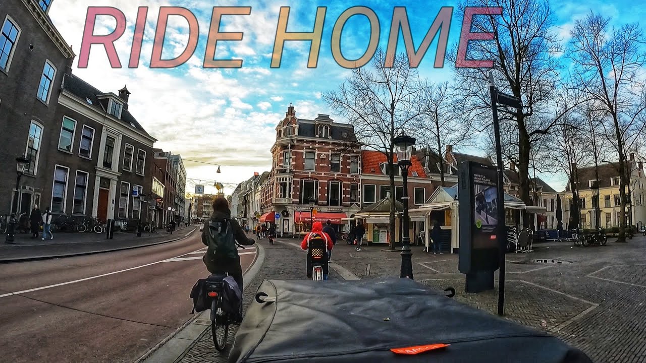 Ride back home on a cargo bike (bakfiets) with my son through picturesque city of Utrecht.