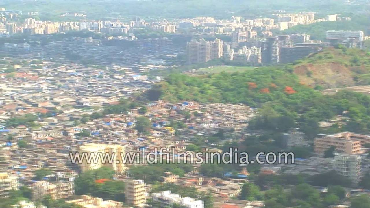 Slums and plush new commercial buildings co-exist in Mumbai: aerial view