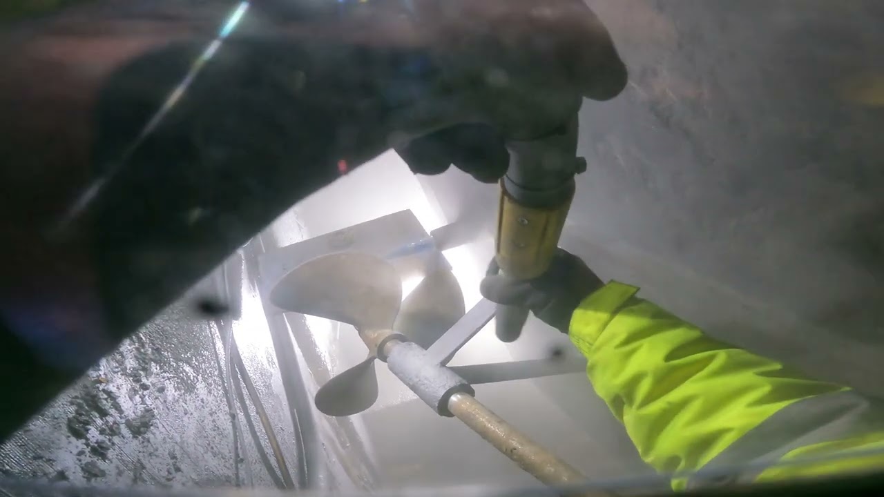Sandblasting a pleasure boat ready for repainting