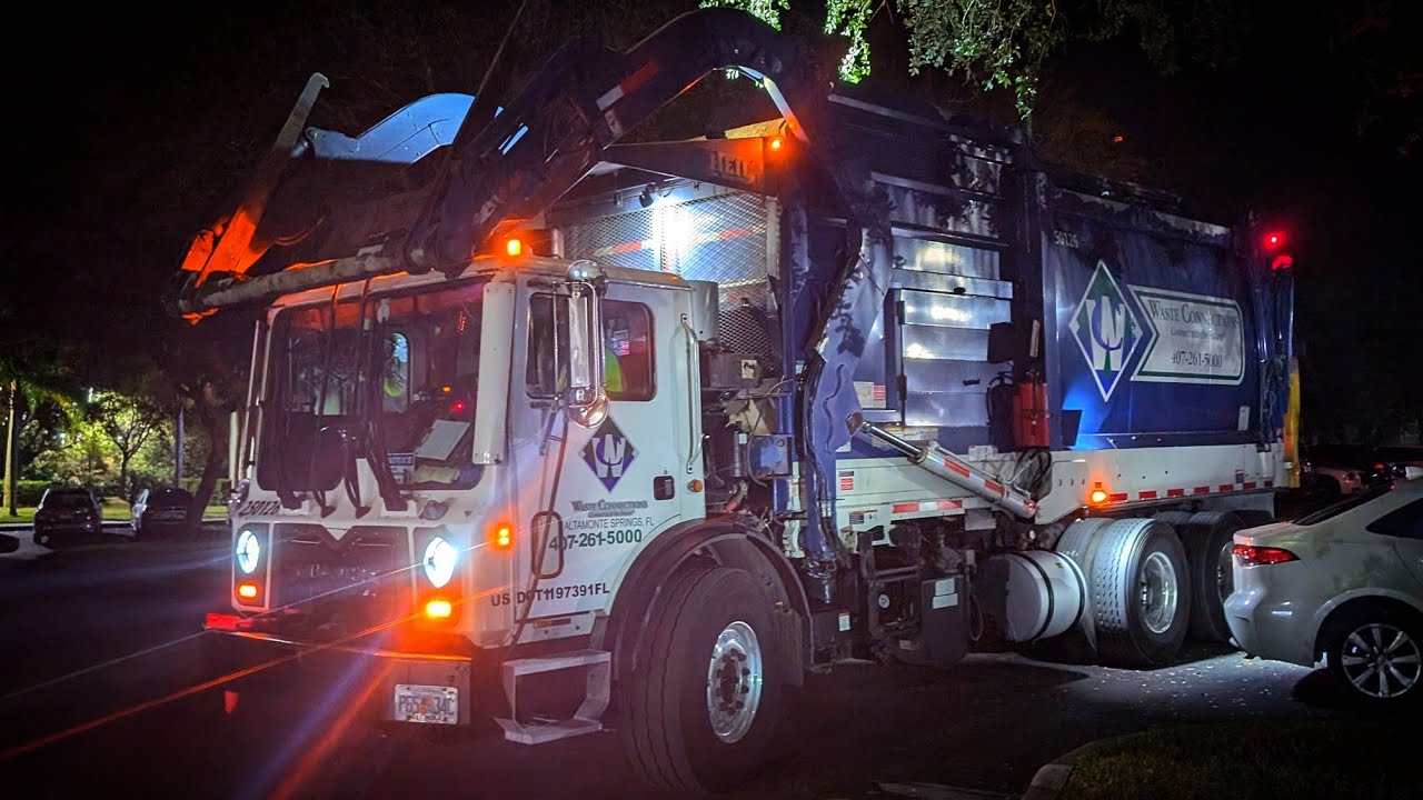 Waste Connections | Mack MRU - Heil Half/Pack Front Loader