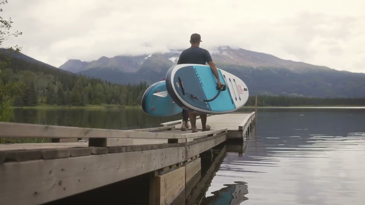 Paddle boarding at Dennis Lake Recreation Site near Smithers, BC. With camper van / RV.