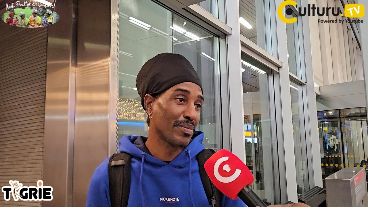 Schiphol, Surinamers in kerststemming op weg naar Suriname