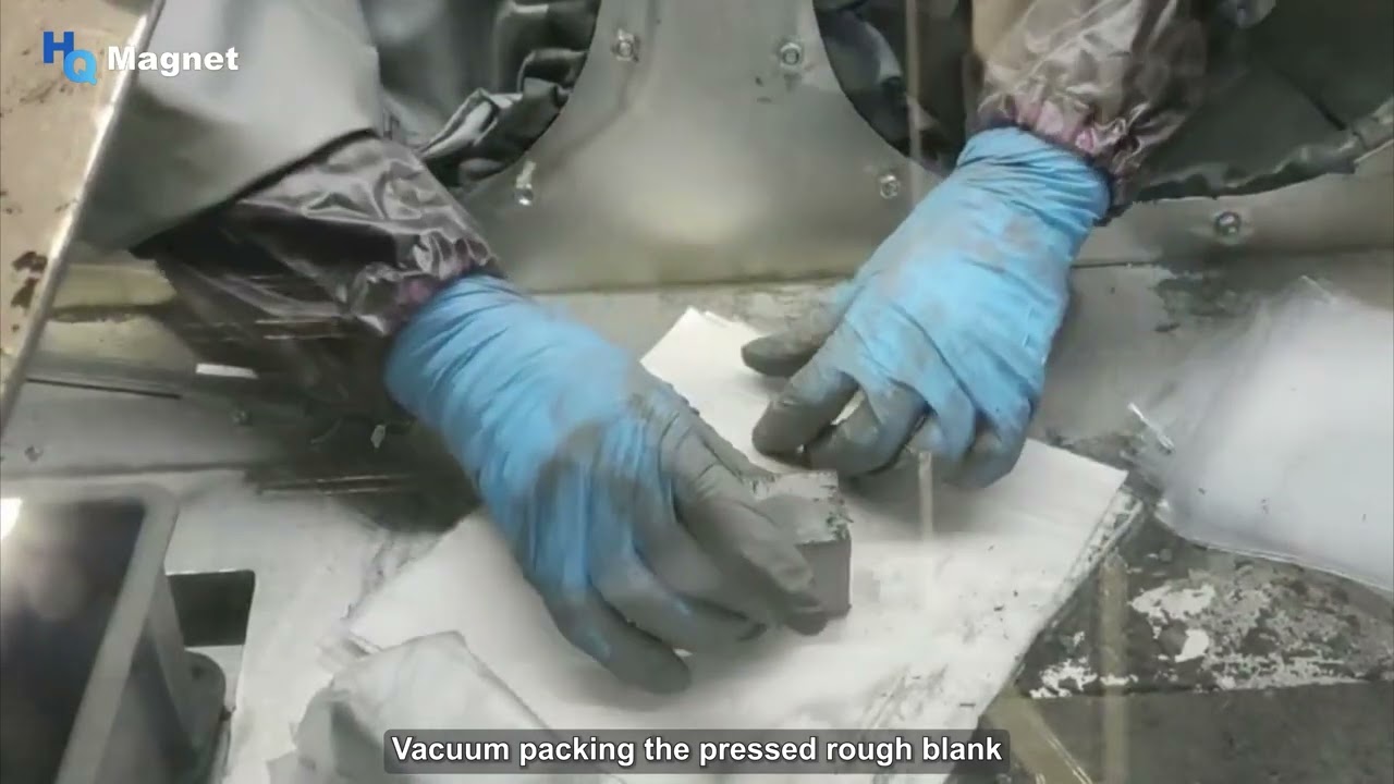 Pressing process for sintered neodymium magnets