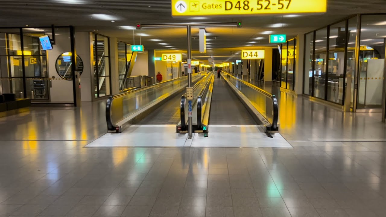 Amsterdam Schiphol Airport. 1x Travelator ride at gates D44-52