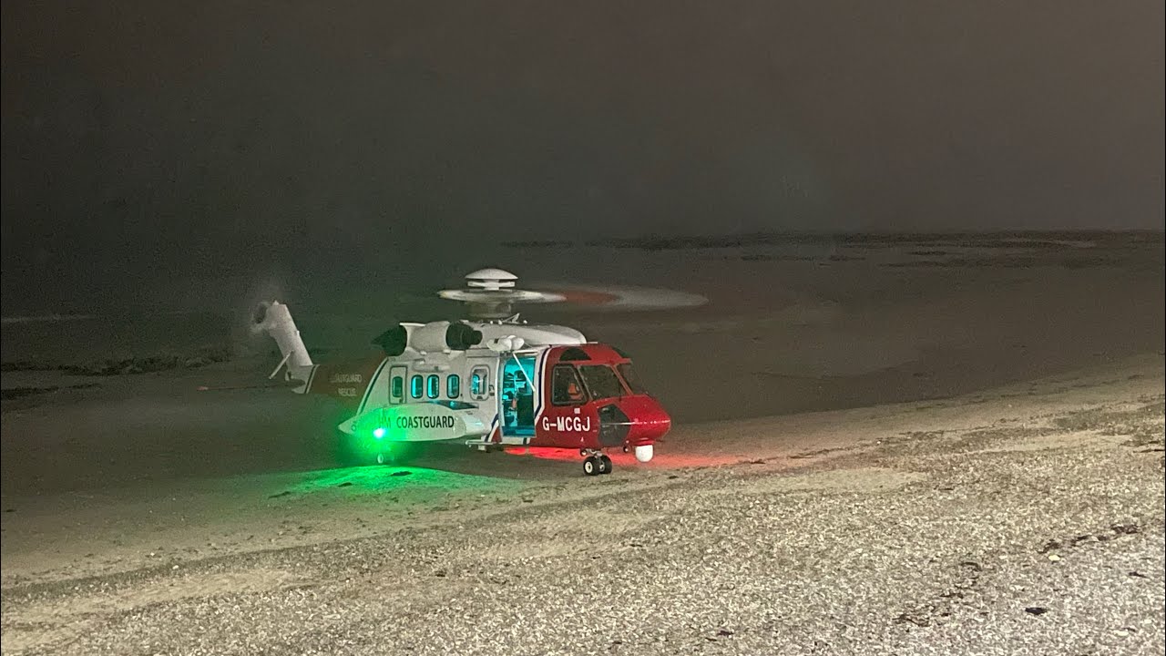 Coastguard Helicopter landing on Douglas Beach, Isle of Man