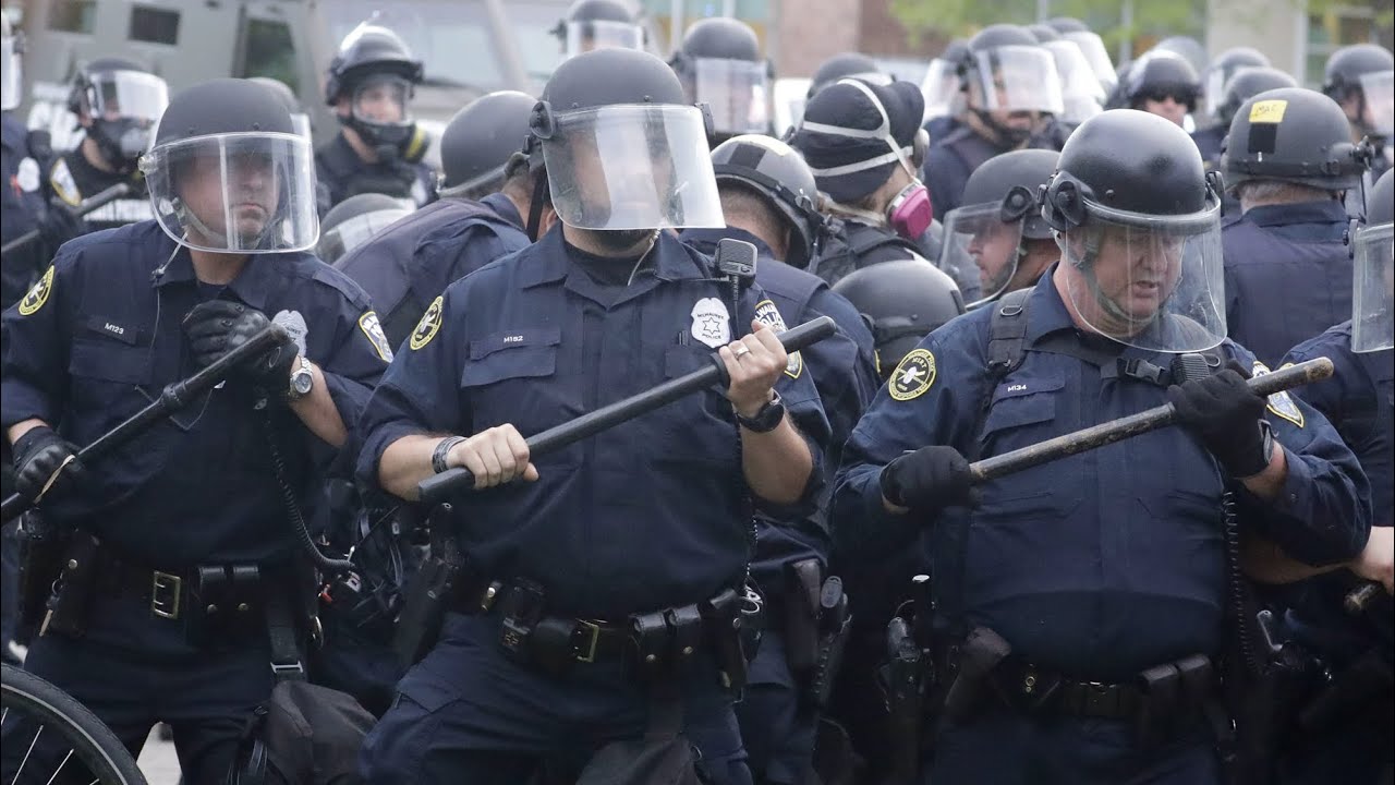 Rocks, glass thrown at police, crowds disperse after tear gas fired at crowd