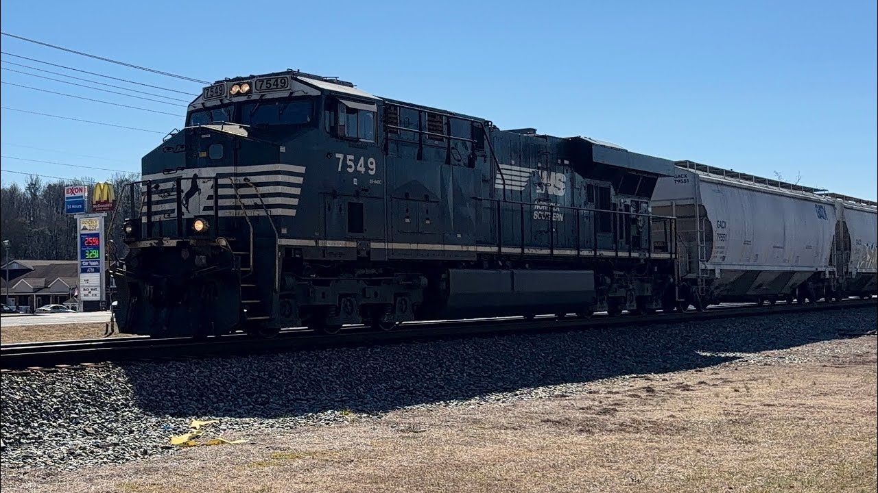 Norfolk Southern mixed freight train with rear DPU heads NB through SpringCity 