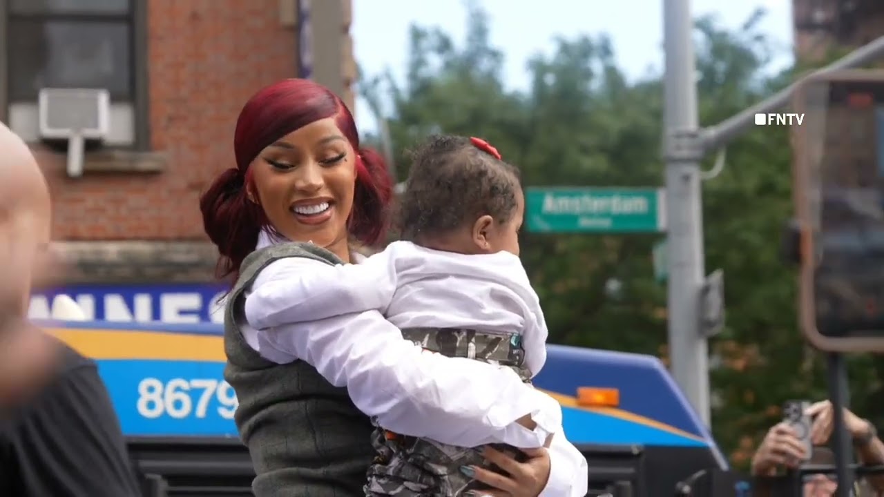 Cardi B Climbs through Sun Roof to greet Fans outside NYC Bodega 