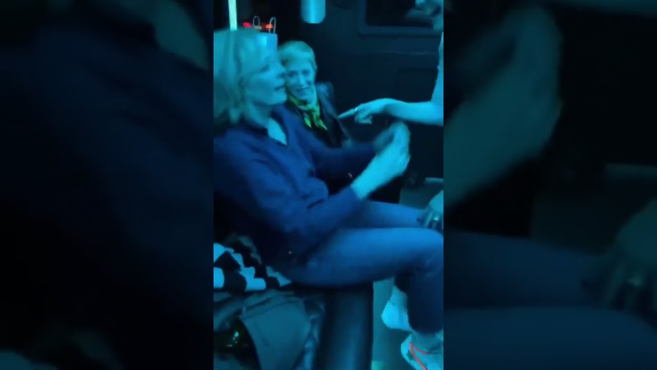 New | Sarah Paulson with Holland Taylor at a bus party with friends