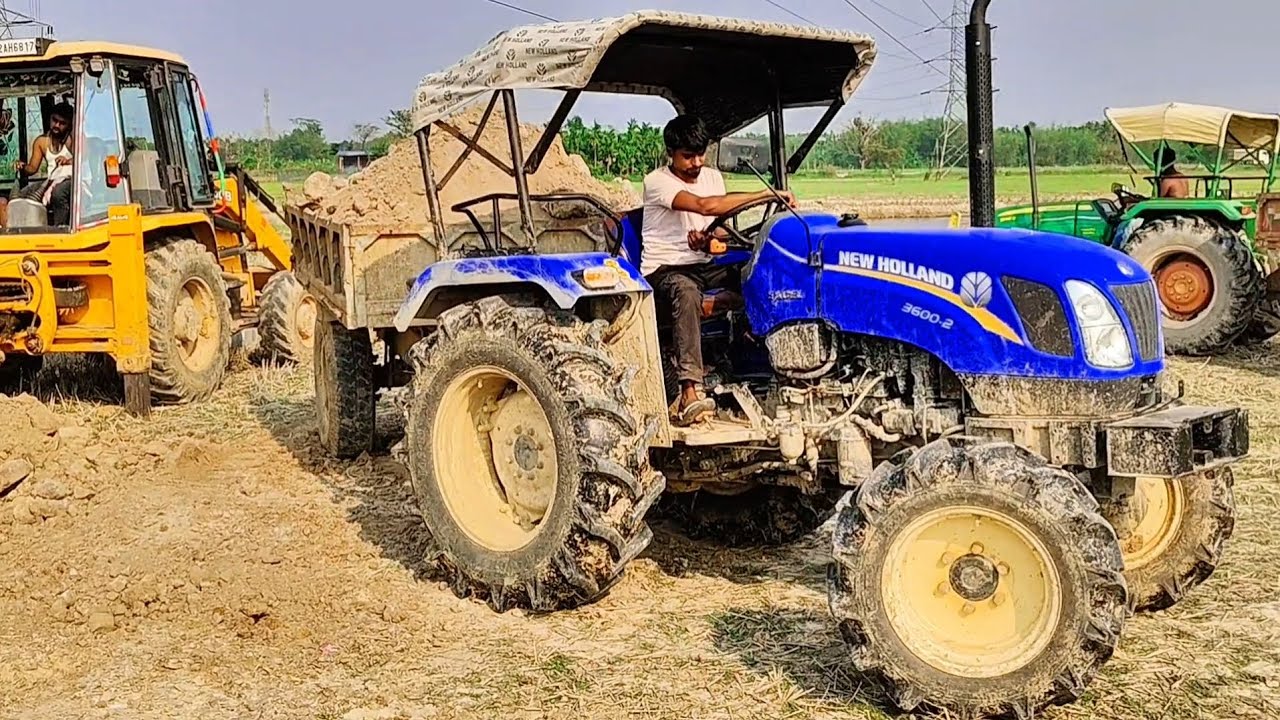 1 JCB vs 25 Tractors! Mahindra, Sonalika & Swaraj Huge Soil Loading Project, and trolley pulling 