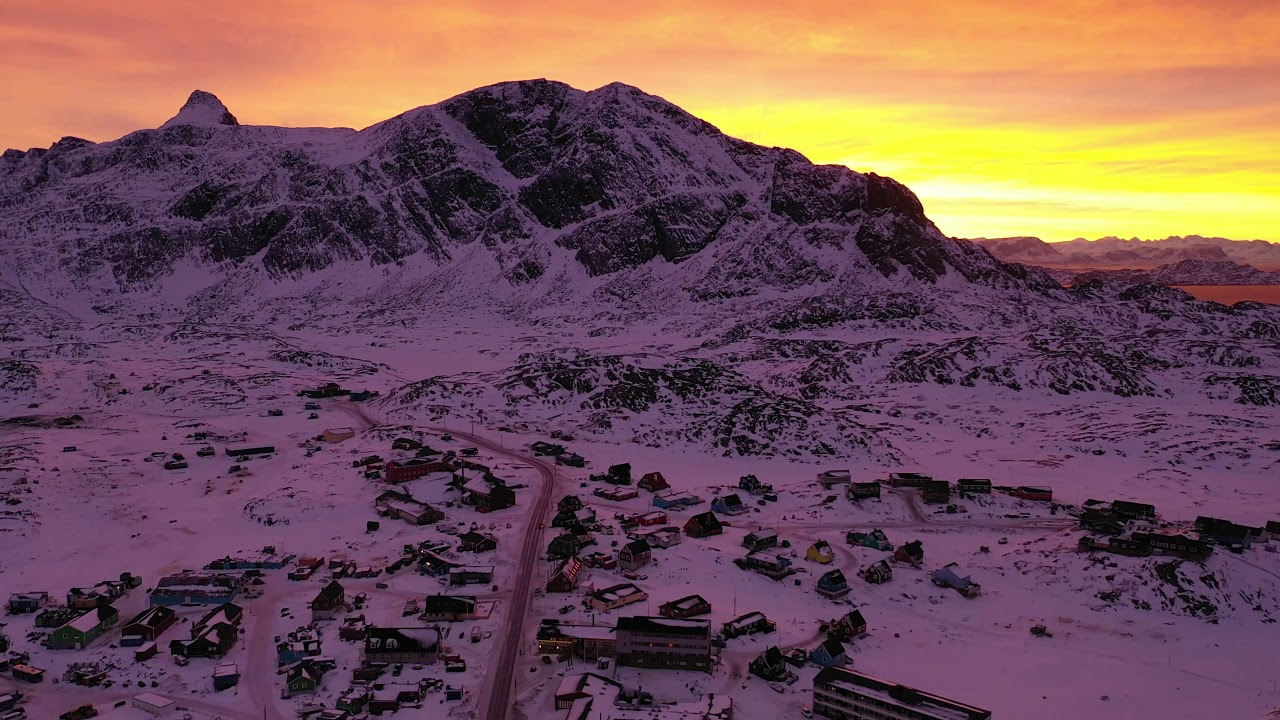 Dog sled trip in Sisimiut in Greenland, arctic drone footage