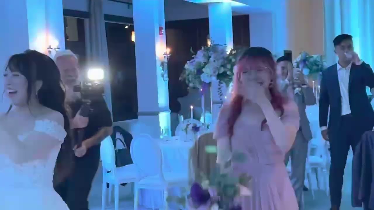 catching the bouquet at wendy’s wedding