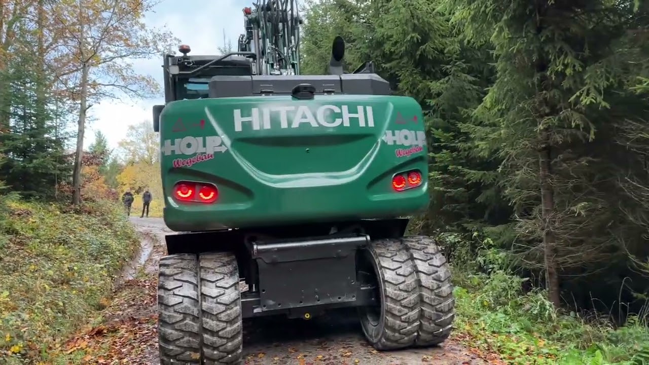 Hitachi Zaxis 140W with Holp GmbH Rototop and VarioLöffel multi function bucket.