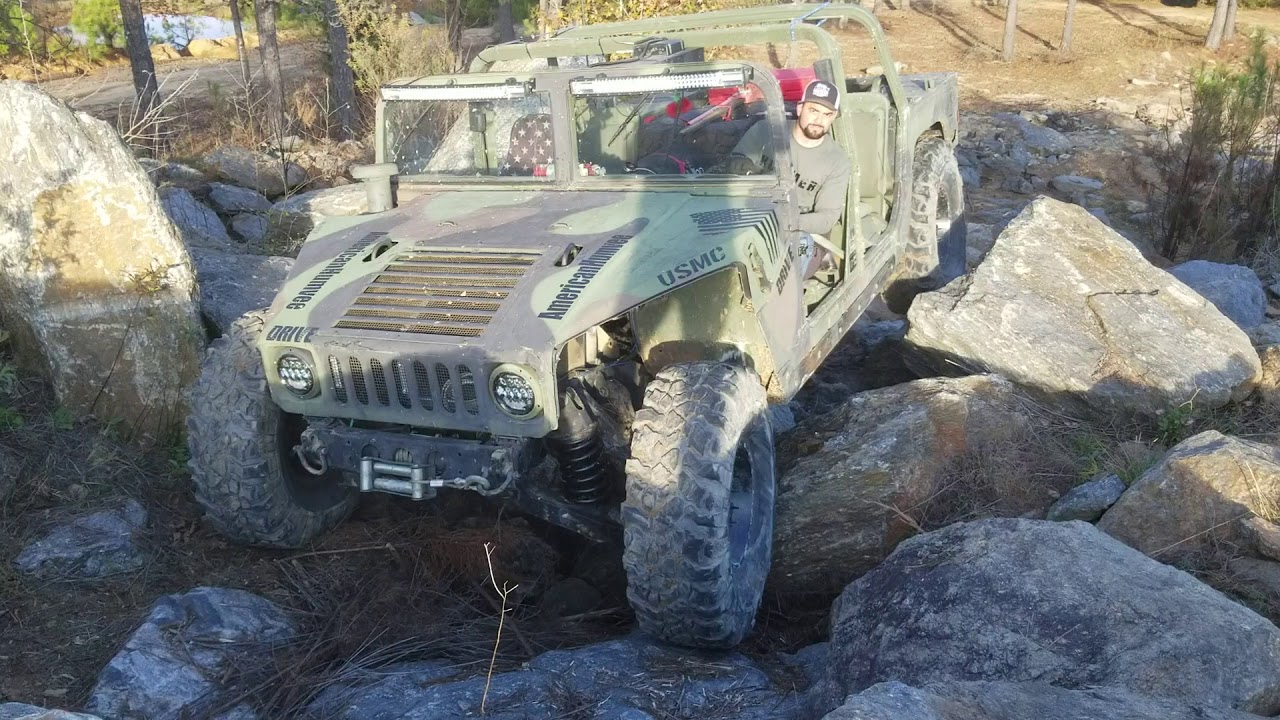 Rock crawling Hummer H1 HMMWV at Boggin on the Plains Auburn Alabama.