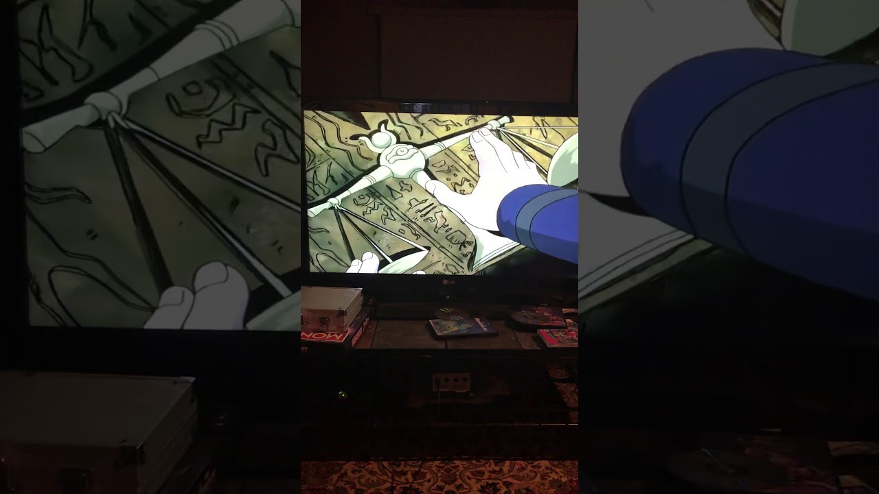 Yugioh Dawn of the duel Yugi puts the 7 millennium items within the millennium stone.