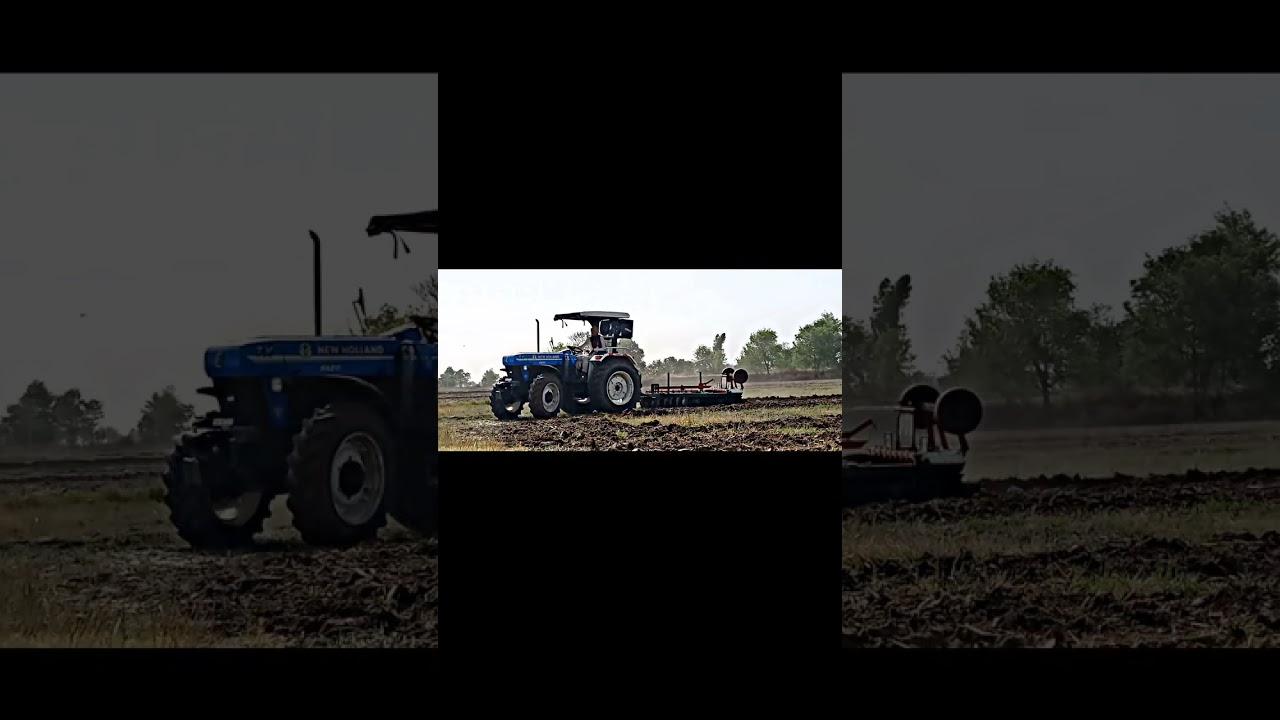 New holland 5620 4&times;4 performing on harrow