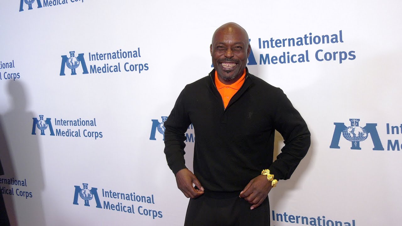 Jimmy Jean-Louis walks the red carpet at the 2025 International Medical Corps Annual Awards