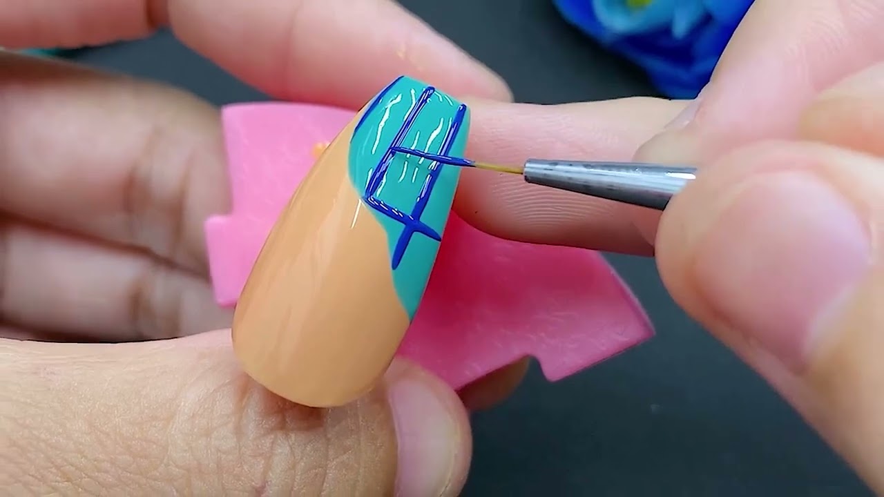 33  How To Make Nail green tree decoration next to red flower yellow and blue background