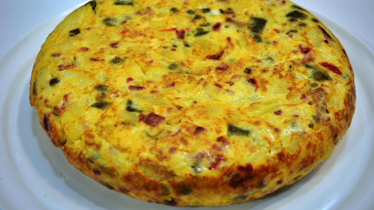 Tortilla de patatas con jamón y alcachofas de Tudela