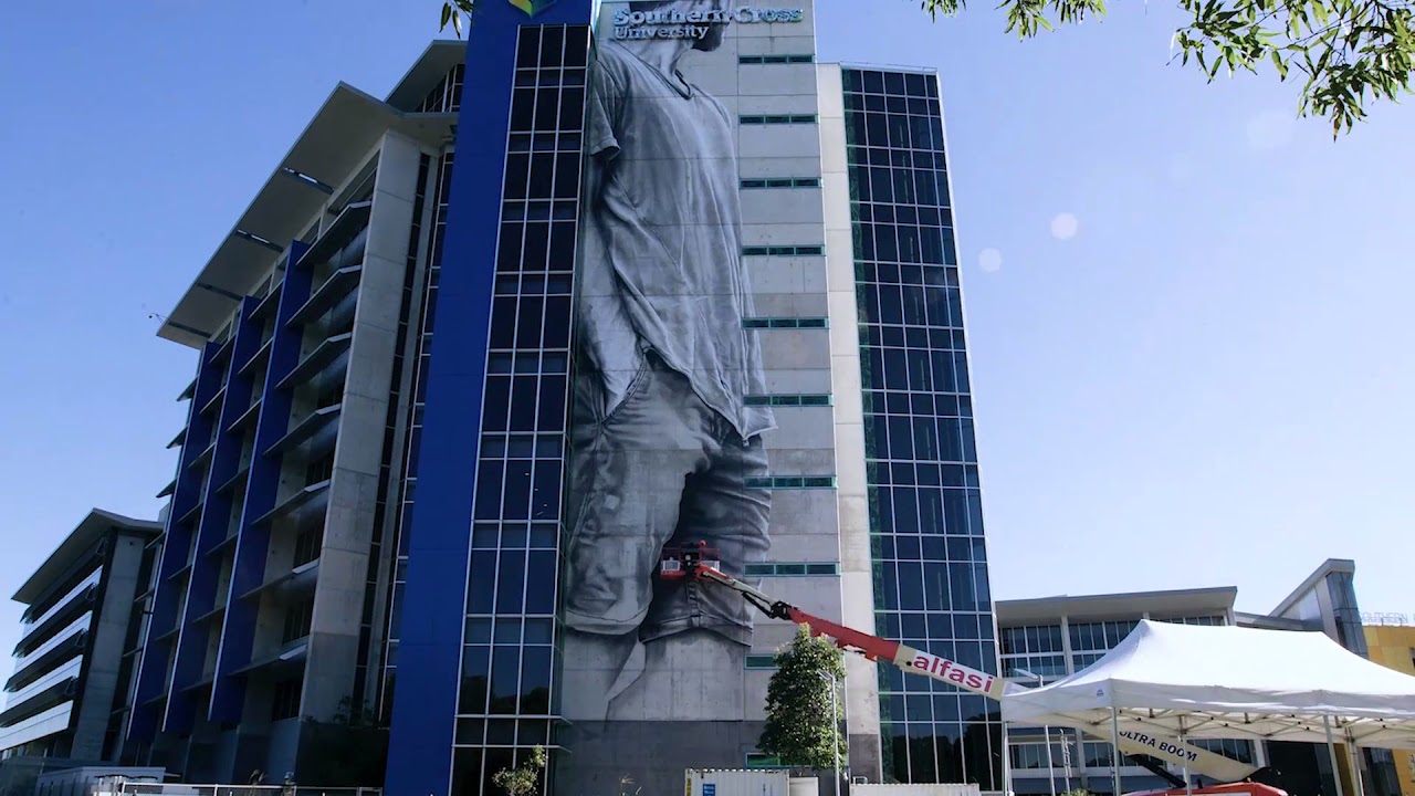 Guido van Helten paints mural at Southern Cross University