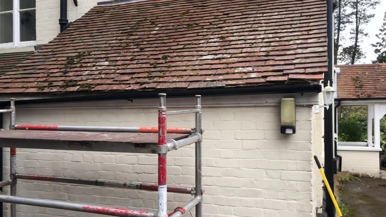 Doff roof cleaning tiles and gravel driveway using the Therma-Tech superheated cleaning system