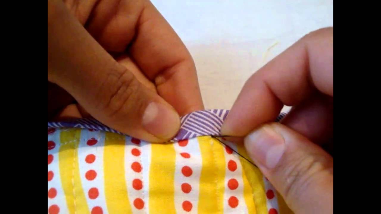 How to hand sew binding to back of quilt