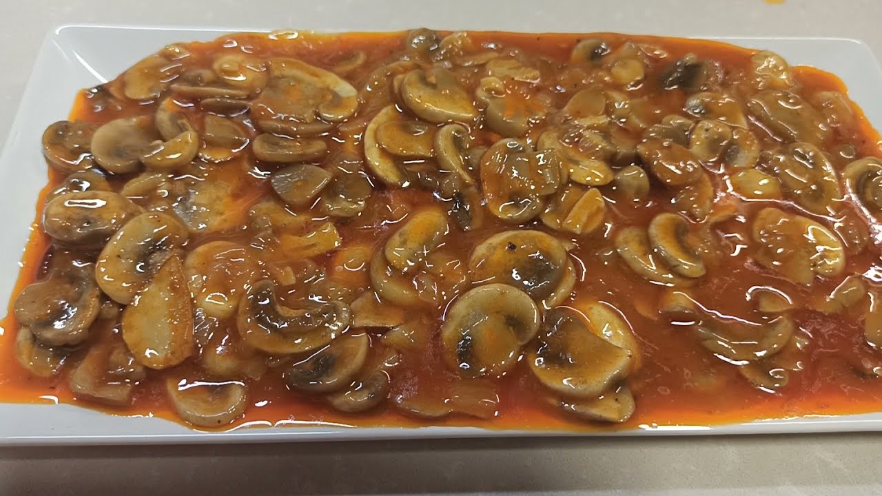 CHAMPIÑONES EN SALSA