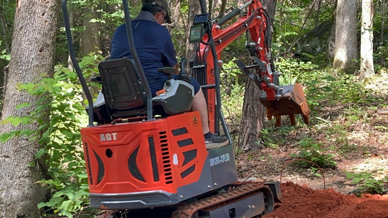 Building the driveway with the Chinese mini excavator