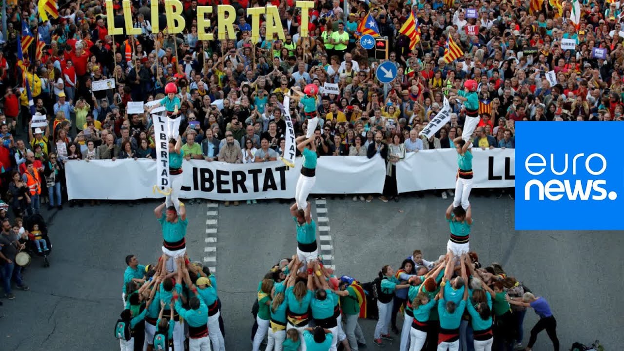 Catalonia protests turn violent as militants clash with police after 350,000-strong peaceful march