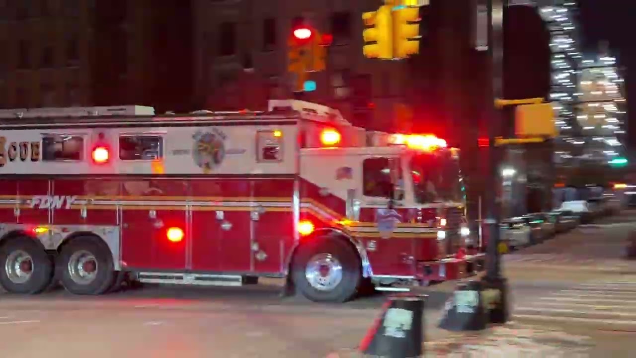 FDNY RESCUE 3, “BIG BLUE”, RESPONDING ON THE GRAND CONCOURSE IN FORDHAM AREA OF THE BRONX, NEW YORK.