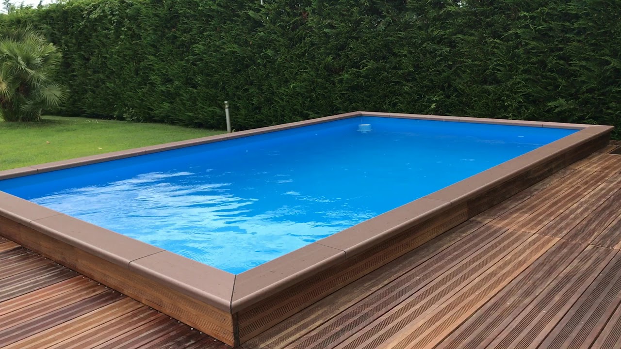 Piscina di libera installazione con solarium in legno pregiato | Semplicemente Piscina