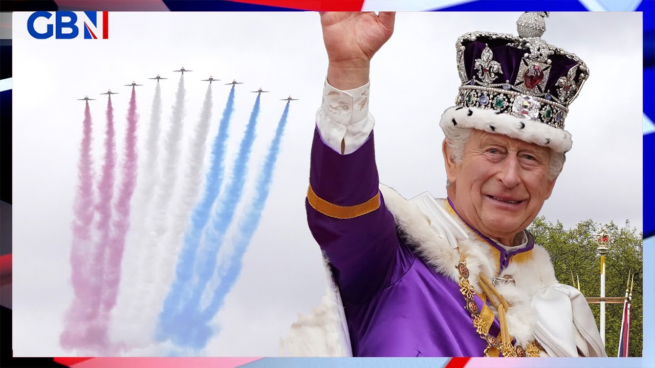 Coronation flypast: King Charles watches the Red Arrows fly over Buckingham Palace