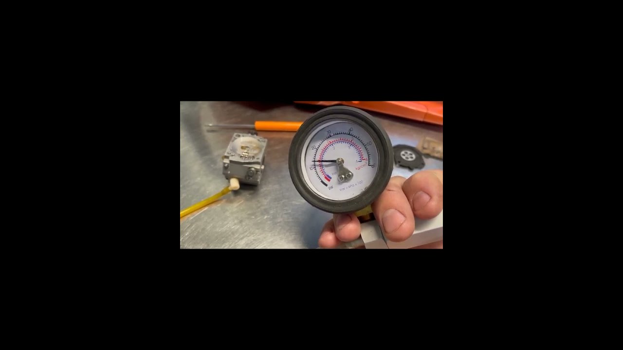 Carb, checking pop off pressure and needle sealing.