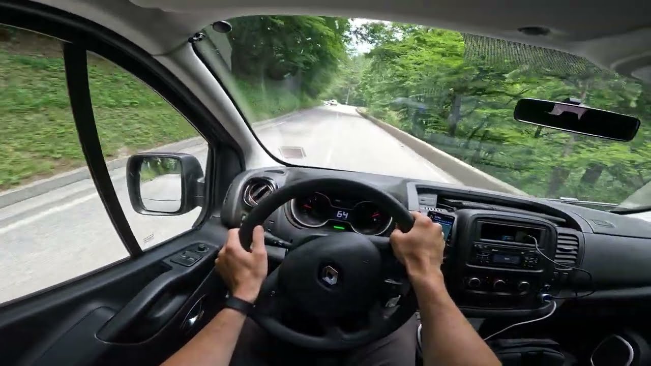 Driving from Châtillon-sur-Cluses to Les Gets. Renault Trafic. POV. Summer. Sunny day. France.