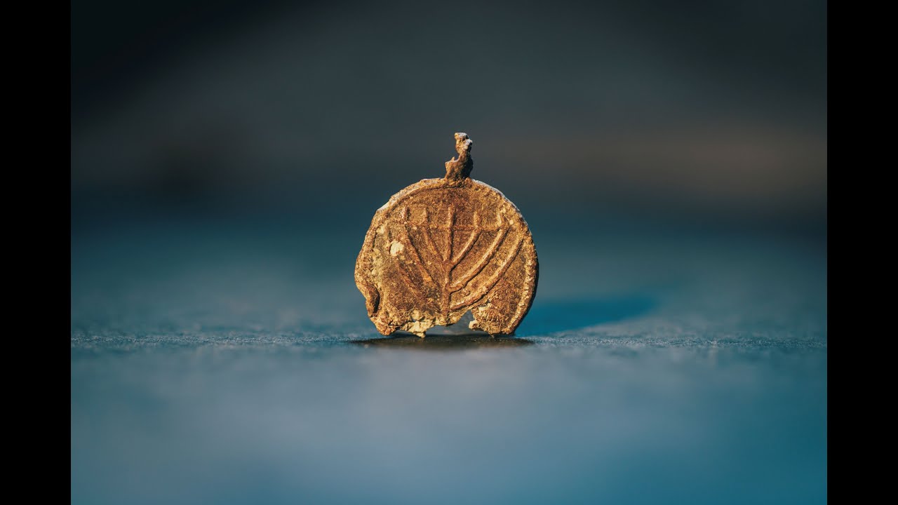 A Rare Lead Menorah Pendant from 1,300 Years Ago Discovered near the City of David