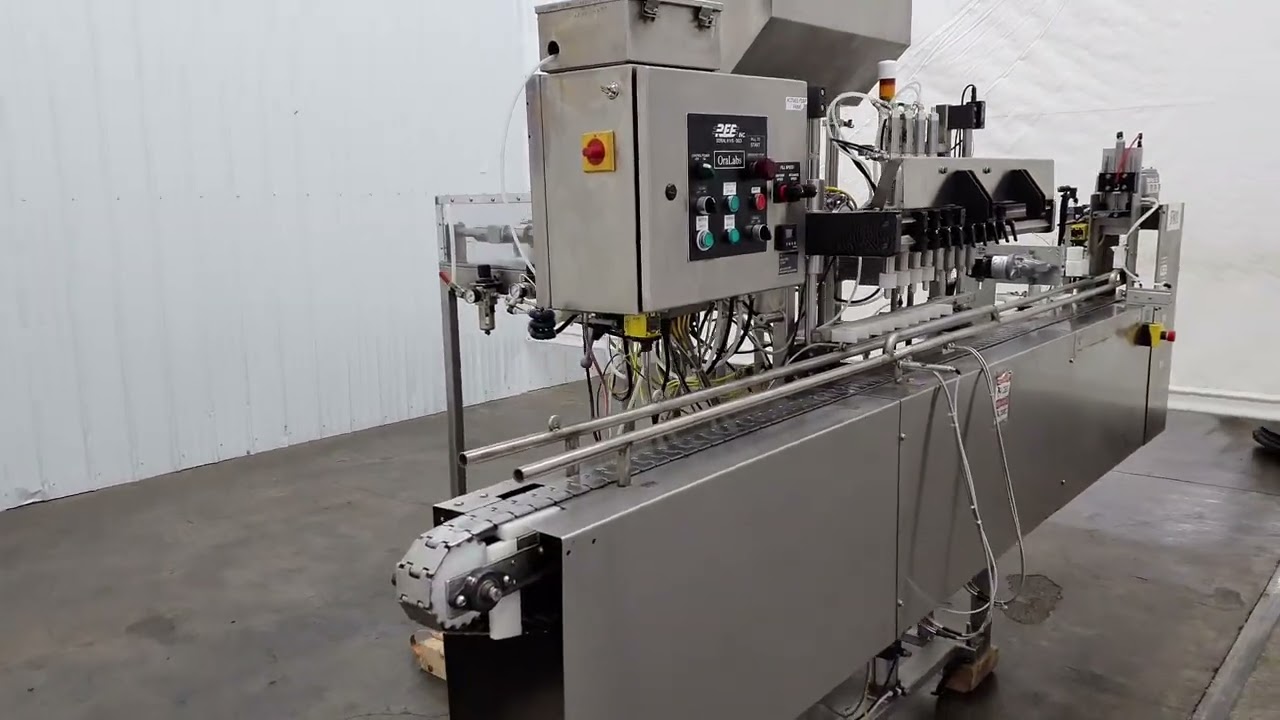 E324259 - REB 4 Head Inline Filler and Capper with Air Rinser